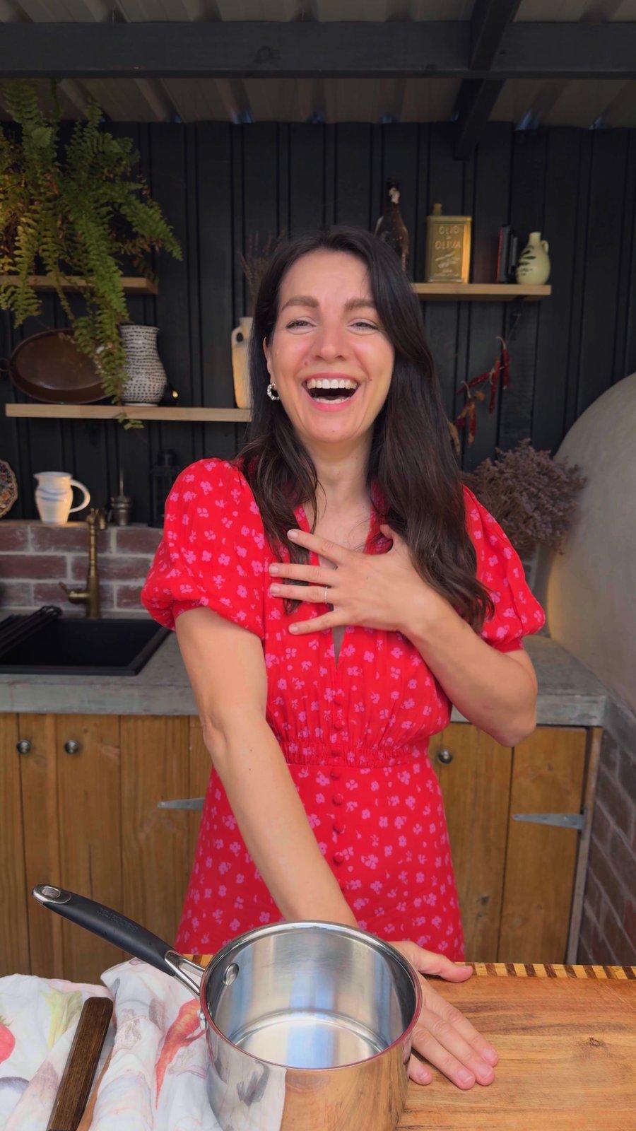 Snezana laughing in her outdoor kitchen