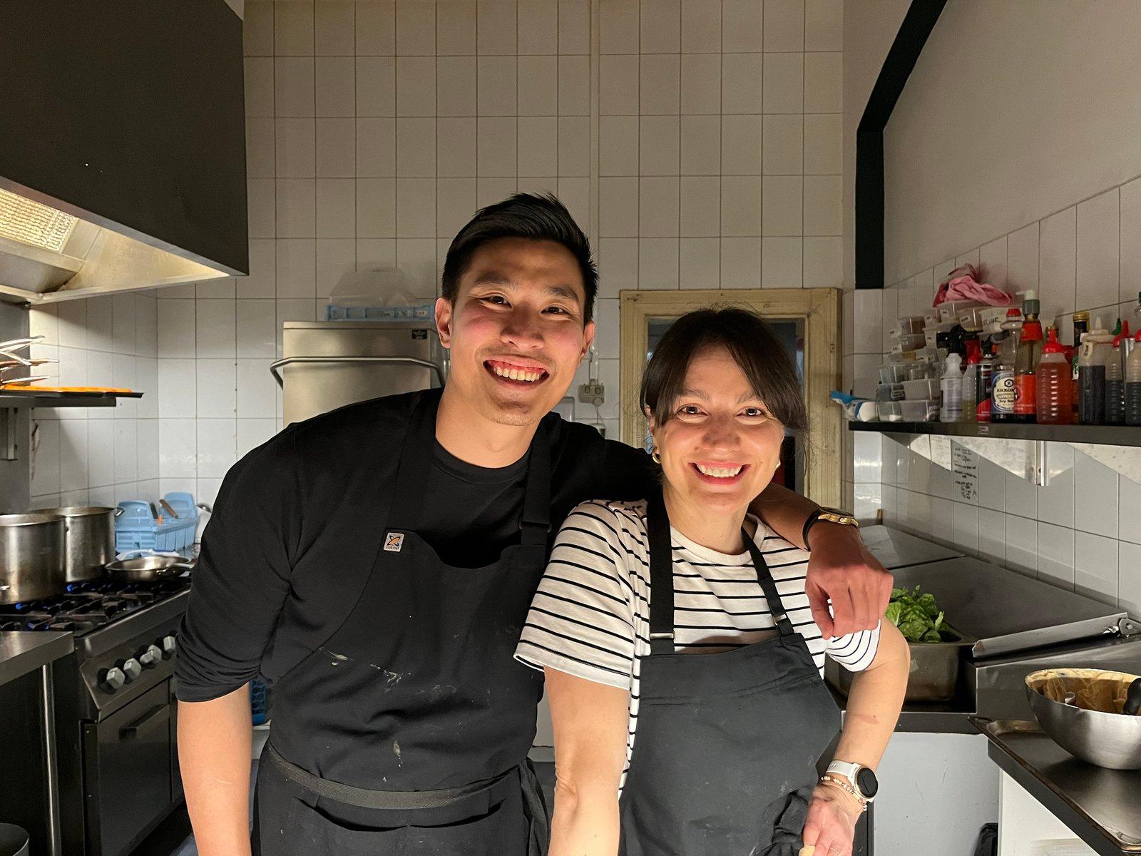 Snezana and David Tan smiling together in the kitchen during their pop-up